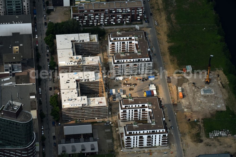 Aerial image Hamburg - Construction site to build a new multi-family residential complex at the Schellerdamm in Hamburg. The HOCHTIEF incorporated company is building, according to instructions of architect Heiner Limbrock, for owner Aurelius Immobilien AG a modern housing area