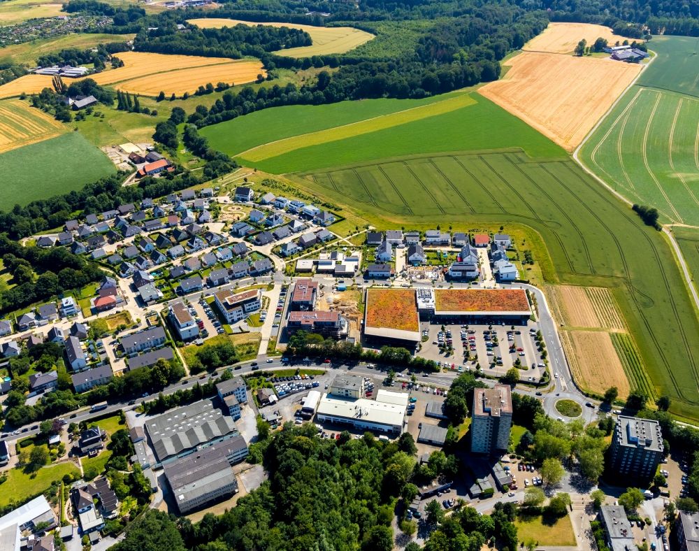 Aerial image Heiligenhaus - Construction site for the construction of a multi-family residential complex Haus Selbeck and the local supply center in Heiligenhaus in the federal state of North Rhine-Westphalia, Germany