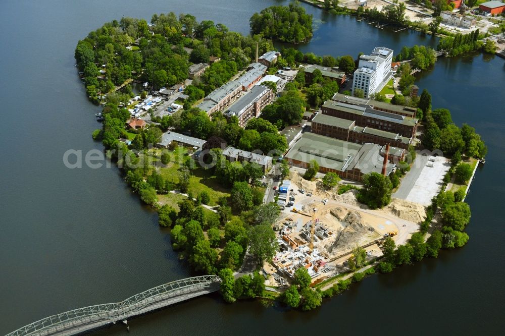 Berlin from above - Construction site for the construction of an apartment building on the Havel island of Eiswerder in the district of Hakenfelde in Berlin, Germany