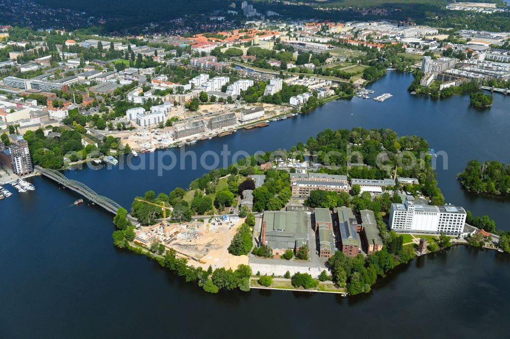 Berlin from the bird's eye view: Construction site for the construction of an apartment building on the Havel island of Eiswerder in the district of Hakenfelde in Berlin, Germany