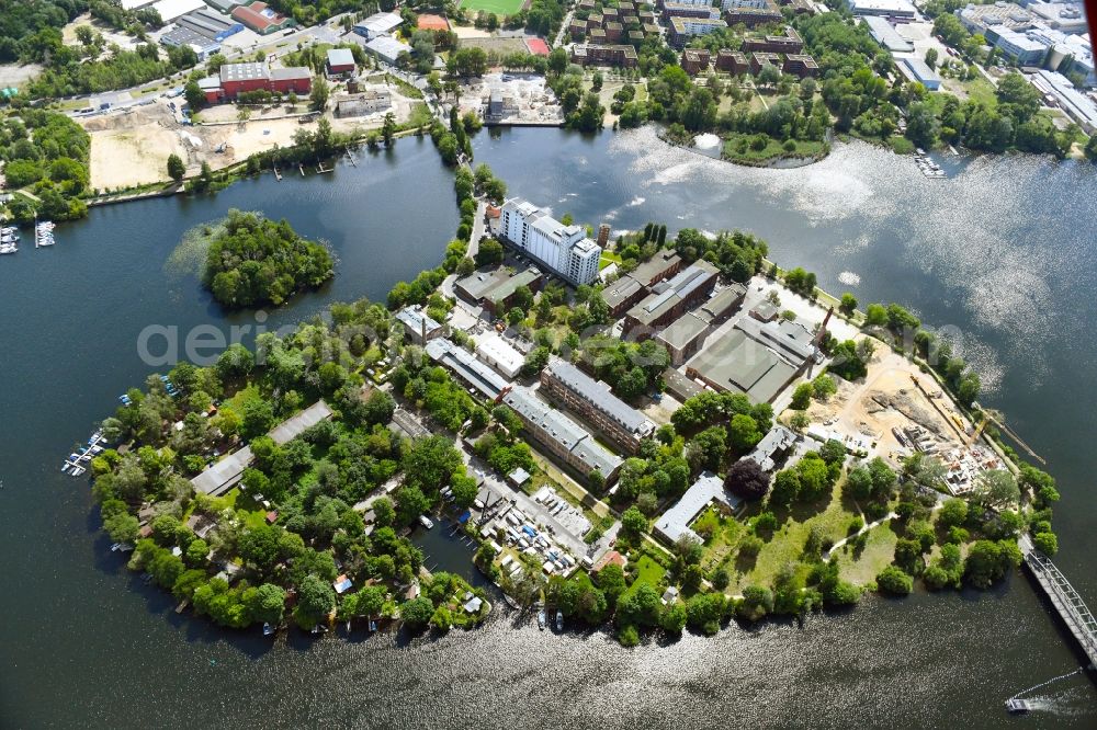 Aerial image Berlin - Construction site for the construction of an apartment building on the Havel island of Eiswerder in the district of Hakenfelde in Berlin, Germany