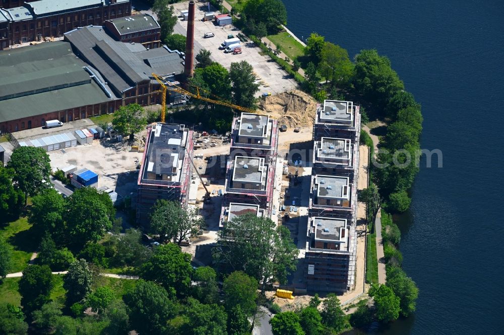 Berlin from above - Construction site for the construction of an apartment building on the Havel island of Eiswerder in the district of Hakenfelde in Berlin, Germany