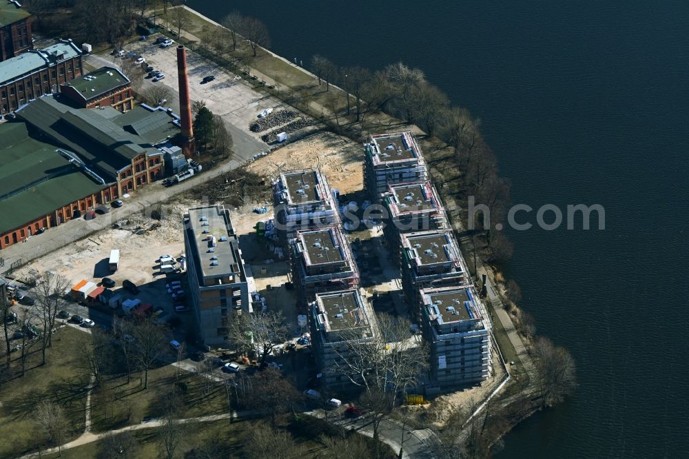 Berlin from above - Construction site for the construction of an apartment building on the Havel island of Eiswerder in the district of Spandau Hakenfelde in Berlin, Germany