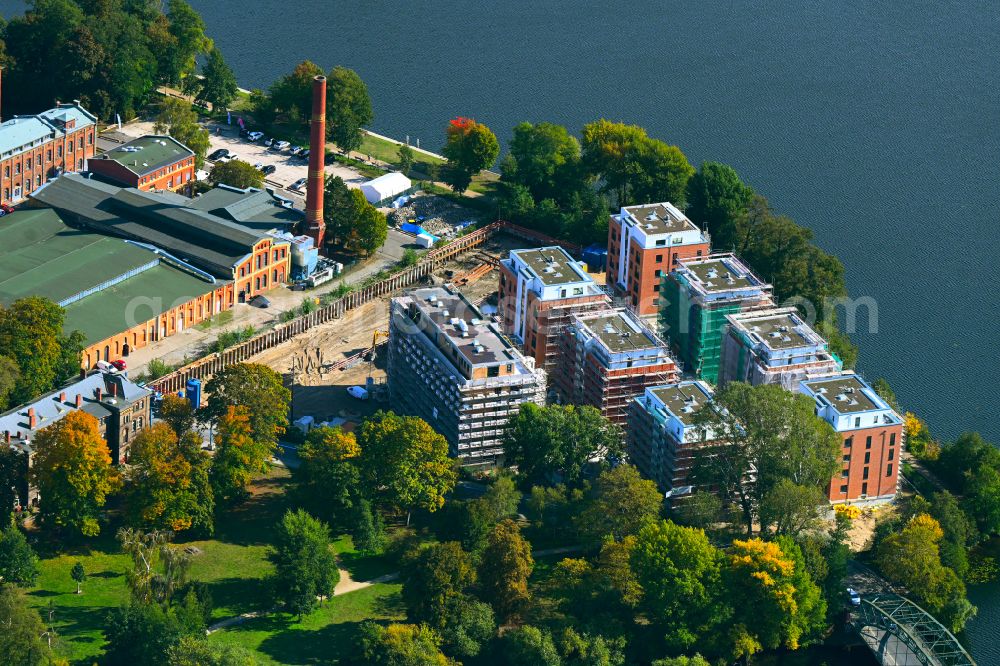 Berlin from the bird's eye view: Construction site for the construction of an apartment building on the Havel island of Eiswerder in the district on street Eiswerderstrasse of Spandau Hakenfelde in Berlin, Germany
