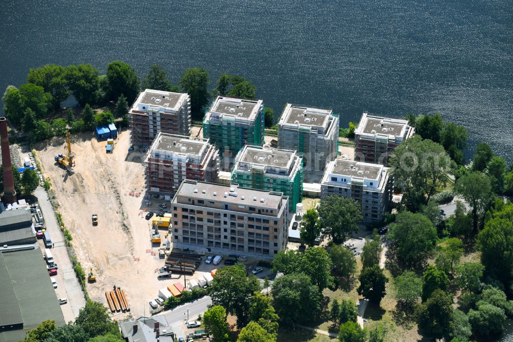 Berlin from above - Construction site for the construction of an apartment building on the Havel island of Eiswerder in the district of Spandau Hakenfelde in Berlin, Germany