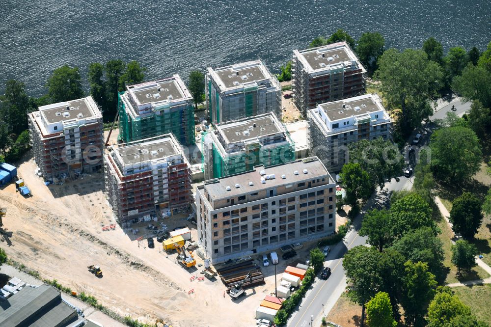 Berlin from the bird's eye view: Construction site for the construction of an apartment building on the Havel island of Eiswerder in the district of Spandau Hakenfelde in Berlin, Germany