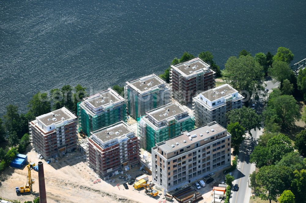 Aerial image Berlin - Construction site for the construction of an apartment building on the Havel island of Eiswerder in the district of Spandau Hakenfelde in Berlin, Germany