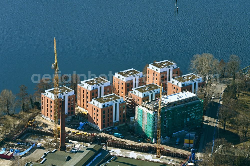 Berlin from above - Construction site for the construction of an apartment building on the Havel island of Eiswerder in the district on street Eiswerderstrasse of Spandau Hakenfelde in Berlin, Germany
