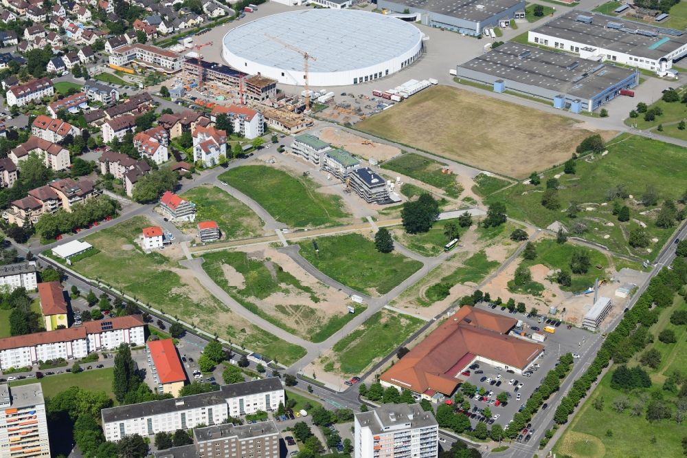 Weil am Rhein from the bird's eye view: Construction site to build a new multi-family residential complex Hohe Strasse at the Vitra Campus in Weil am Rhein in the state Baden-Wurttemberg, Germany