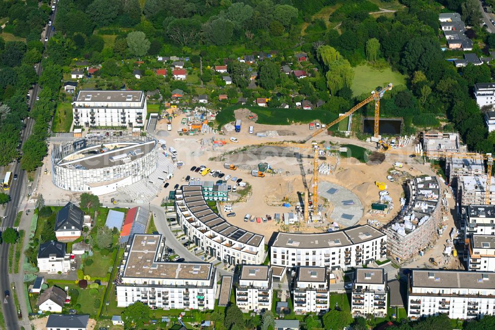 Berlin from the bird's eye view: Construction site to build a new multi-family residential complex HUGOS of Bonava Deutschland GmbH on Britzer Strasse in the district Mariendorf in Berlin, Germany