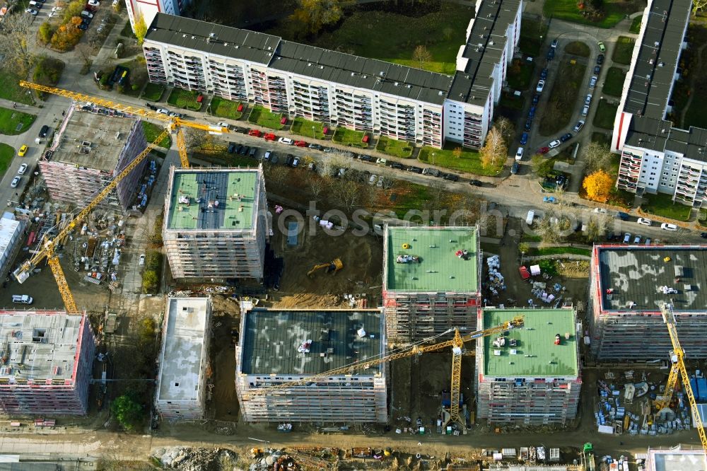 Berlin from the bird's eye view: Construction site to build a new multi-family residential complex on Karl-Holtz-Strasse in the district Marzahn in Berlin, Germany