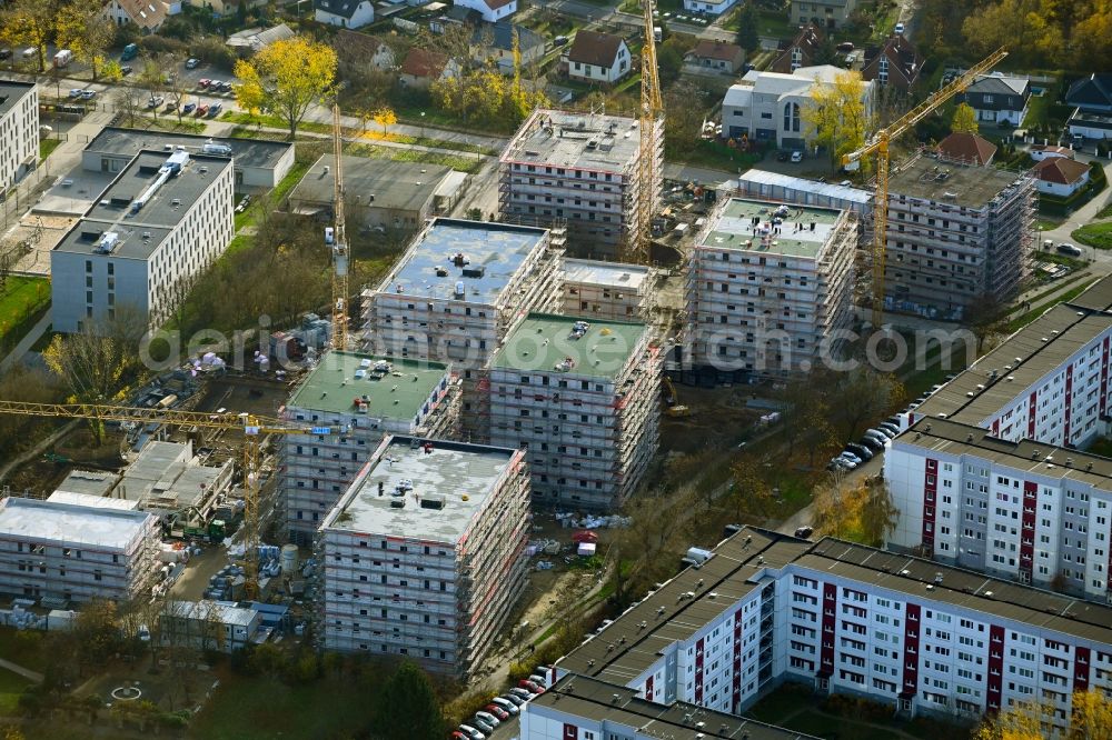 Berlin from the bird's eye view: Construction site to build a new multi-family residential complex on Karl-Holtz-Strasse in the district Marzahn in Berlin, Germany
