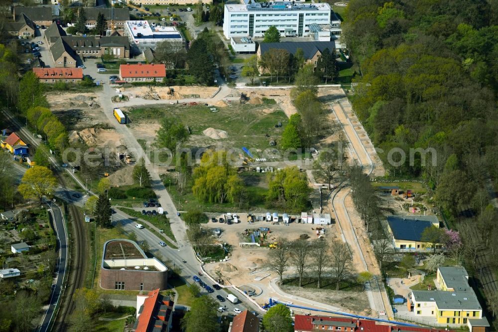 Aerial image Rostock - Construction site to build a new multi-family residential complex and eines Kreisverkehrs between Parkstrasse - Satower Strasse - Tiergartenallee overlooking the Neuapostolische Kirche Gemeinde Rostock in Rostock in the state Mecklenburg - Western Pomerania, Germany