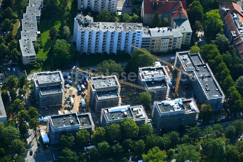 Berlin from the bird's eye view: Construction site to build a new multi-family residential complex on Mudrastrasse in the district Lankwitz in Berlin, Germany