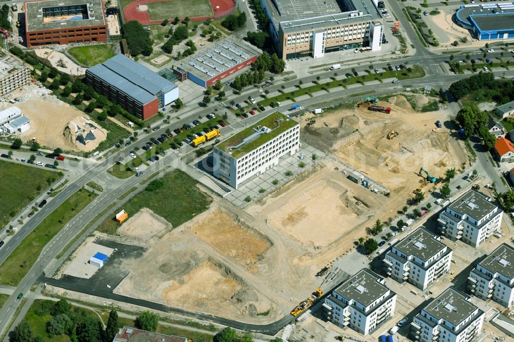 Aerial photograph Schönefeld - Construction site to build a new multi-family residential complex Neue Mitte on Hans-Grade-Allee - Grossziethener Weg - Am Schoenefeld in Schoenefeld in the state Brandenburg, Germany