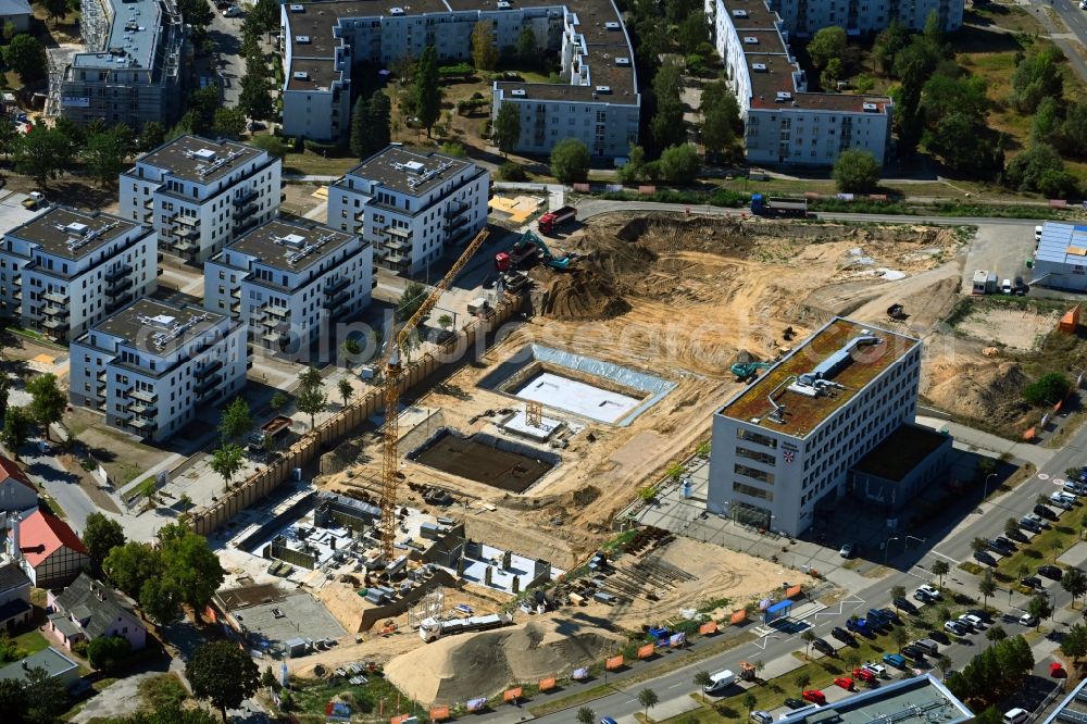 Aerial image Schönefeld - Construction site to build a new multi-family residential complex Neue Mitte on Hans-Grade-Allee - Grossziethener Weg - Am Schoenefeld in Schoenefeld in the state Brandenburg, Germany