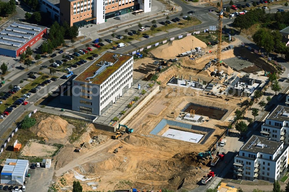 Aerial photograph Schönefeld - Construction site to build a new multi-family residential complex Neue Mitte on Hans-Grade-Allee - Grossziethener Weg - Am Schoenefeld in Schoenefeld in the state Brandenburg, Germany