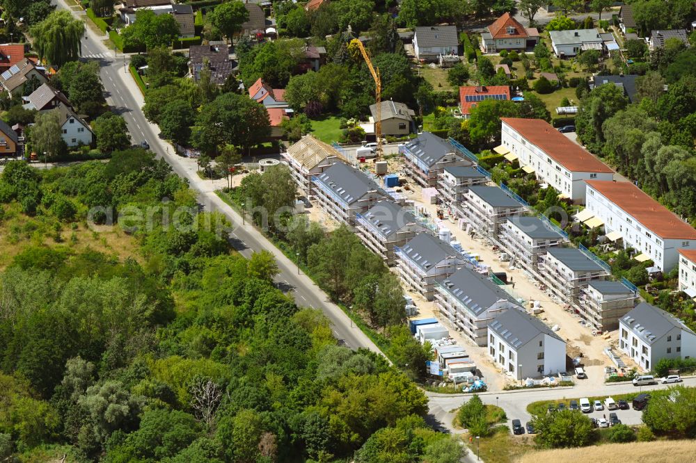 Aerial image Berlin - Construction site to build a new multi-family residential complex Am Niederfeld - Rosenhagener Strasse - Hohenseeweg - Steffenshagener Strasse on street Am Niederfeld in the district Kaulsdorf in Berlin, Germany