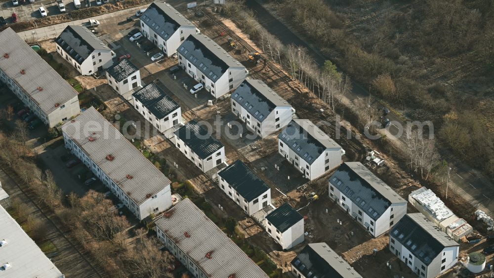Berlin from the bird's eye view: Construction site to build a new multi-family residential complex Am Niederfeld - Rosenhagener Strasse - Hohenseeweg - Steffenshagener Strasse on street Am Niederfeld in the district Kaulsdorf in Berlin, Germany