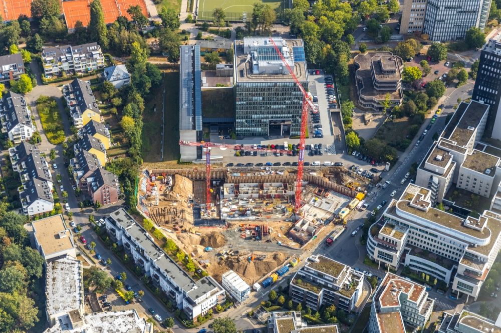 Aerial photograph Düsseldorf - Construction site to build a new multi-family residential complex Niederkasseler Lohweg 20 in the district Loerick in Duesseldorf in the state North Rhine-Westphalia, Germany