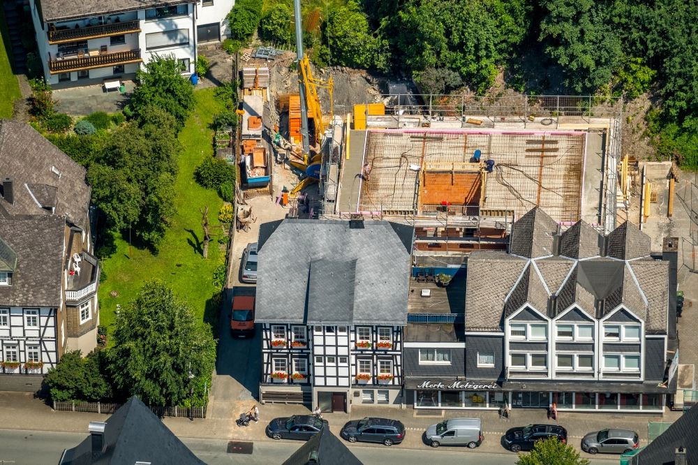 Aerial photograph Schmallenberg - Construction site to build a new multi-family residential complex Im Ohle in Schmallenberg in the state North Rhine-Westphalia, Germany