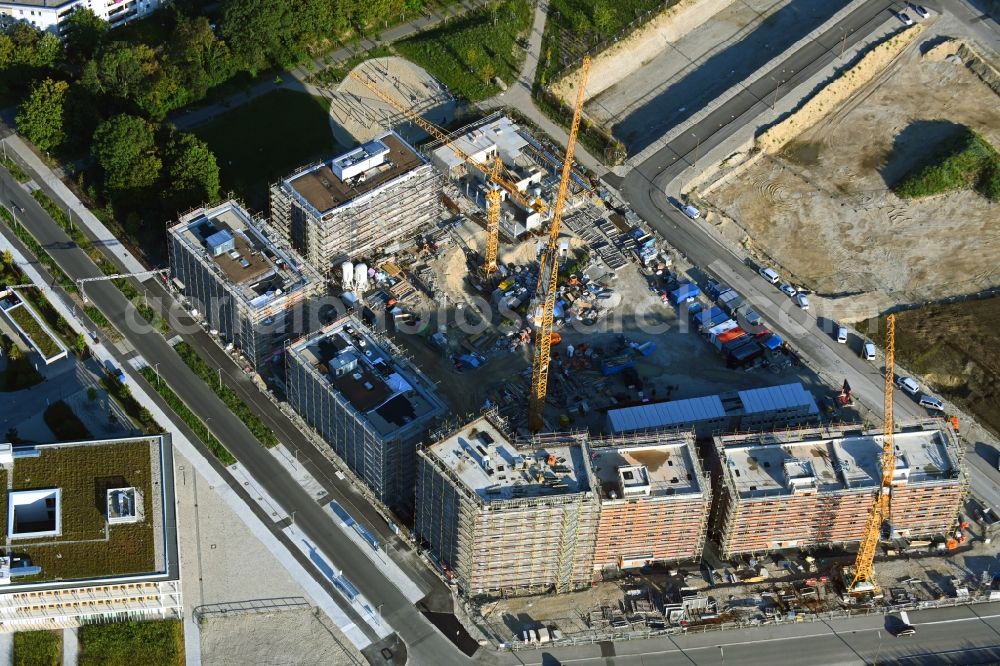 München from the bird's eye view: Construction site to build a new multi-family residential complex in the district Aubing-Lochhausen-Langwied in Munich in the state Bavaria, Germany