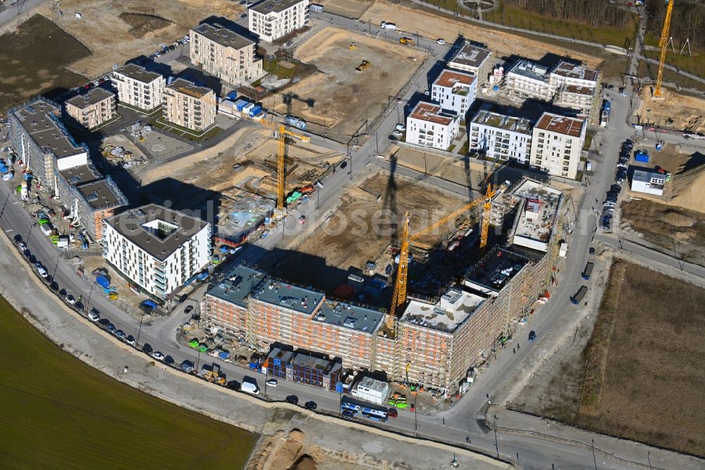 München from above - Construction site to build a new multi-family residential complex in the district Aubing-Lochhausen-Langwied in Munich in the state Bavaria, Germany