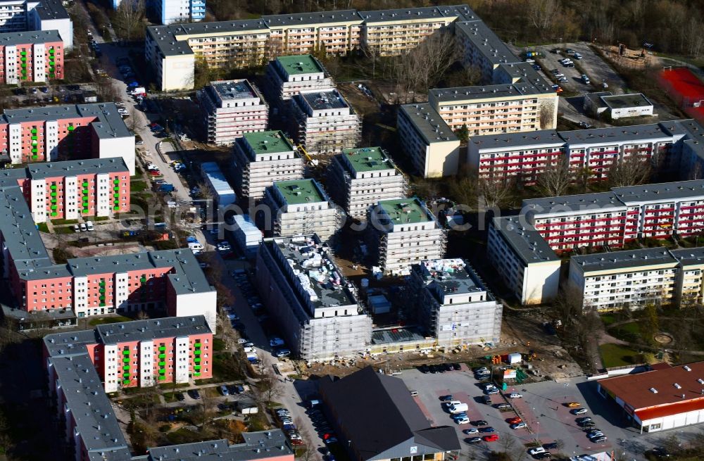 Berlin from the bird's eye view: Construction site to build a new multi-family residential complex along the Tangermuender Strasse in the district Hellersdorf in Berlin, Germany