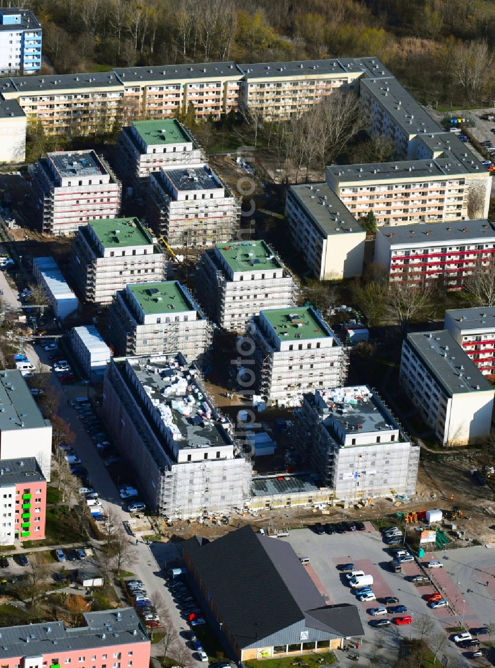 Aerial image Berlin - Construction site to build a new multi-family residential complex along the Tangermuender Strasse in the district Hellersdorf in Berlin, Germany