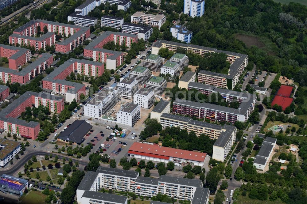 Berlin from above - Construction site to build a new multi-family residential complex along the Tangermuender Strasse in the district Hellersdorf in Berlin, Germany