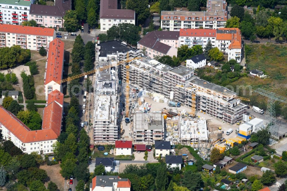 Berlin from the bird's eye view: Construction site to build a new multi-family residential complex Odinstrasse - Rienzistrasse in the district Lichtenberg in Berlin, Germany