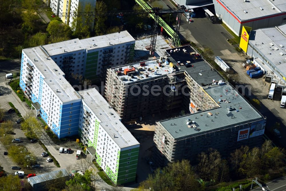 Berlin from the bird's eye view: Construction site to build a new multi-family residential complex on Rhinstrasse in the district Lichtenberg in Berlin, Germany