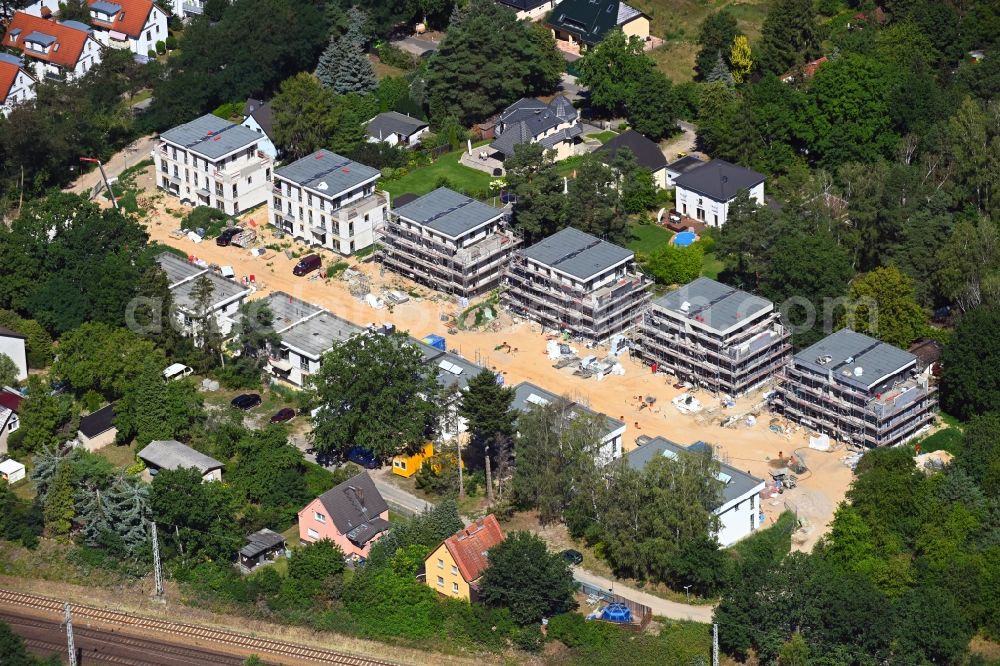 Aerial photograph Hohen Neuendorf - Construction site to build a new multi-family residential complex between Friedrich-Naumann-Strasse and Rosentaler Strasse in the district Niederheide in Hohen Neuendorf in the state Brandenburg, Germany