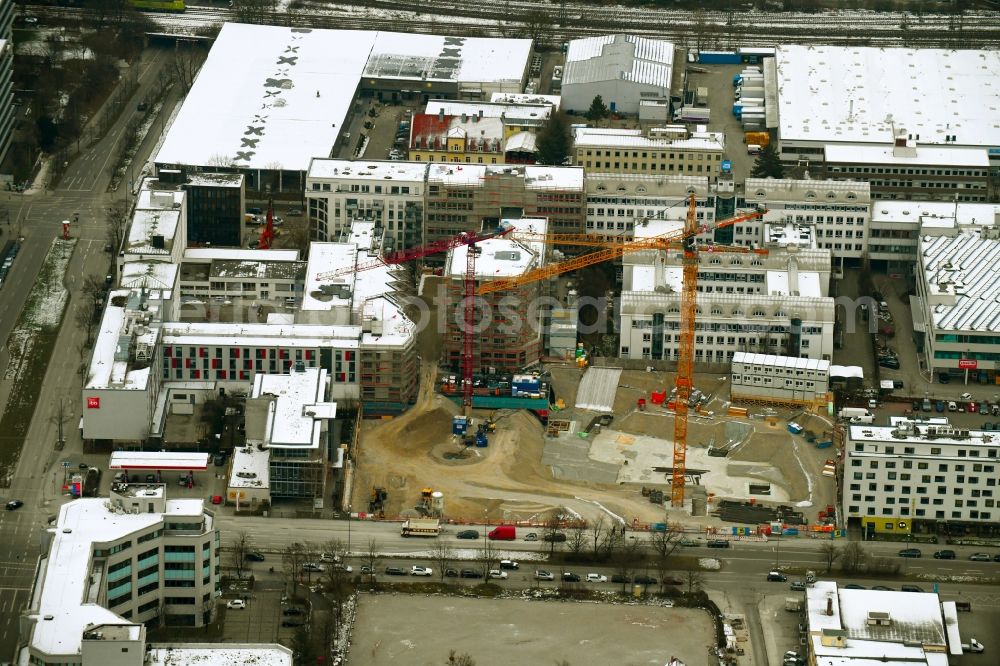 München from the bird's eye view: Construction site to build a new multi-family residential complex Tuebinger Strasse - Hansastrasse in the district Sendling-Westpark in Munich in the state Bavaria, Germany