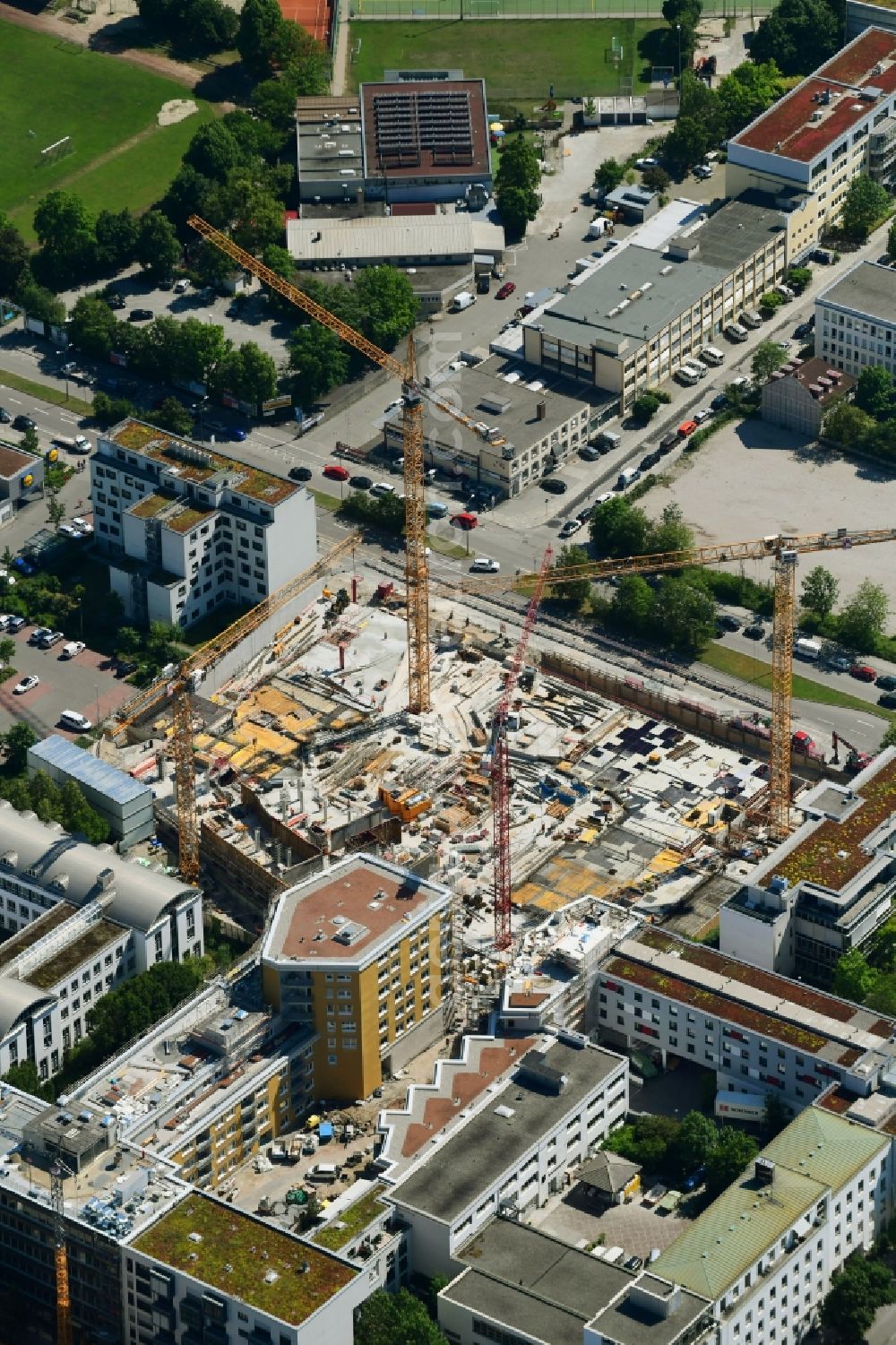 München from above - Construction site to build a new multi-family residential complex Tuebinger Strasse - Hansastrasse in the district Sendling-Westpark in Munich in the state Bavaria, Germany
