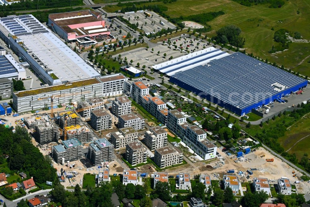 München from the bird's eye view: Construction site to build a new multi-family residential complex Paosopark on Michael - Oechsner - Strasse - Trimburgstrasse - Clara-Schuhmann-Strasse in the district Freiham in Munich in the state Bavaria, Germany