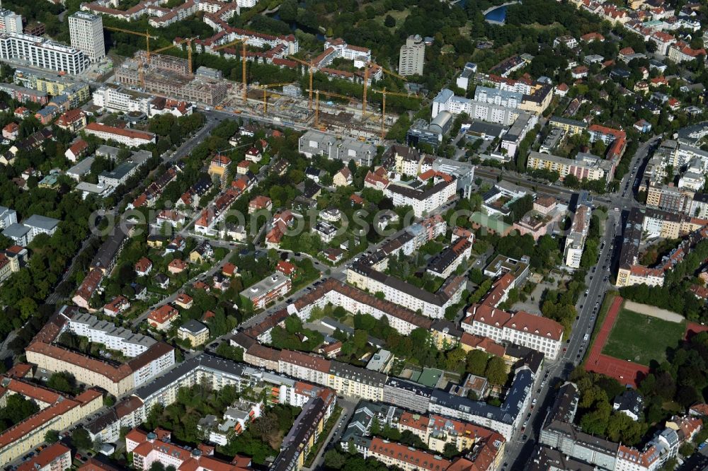 München from the bird's eye view: Construction site to build a new multi-family residential complex an der Rheinstrasse corner Mainzer Strasse in Munich in the state Bavaria
