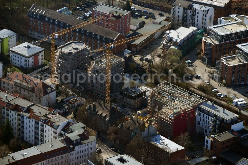 Aerial photograph Leipzig - Construction site to build a new multi-family residential complex LE RIVERHOUSES on Holbeinstrasse on river Weisse Elster in the district Schleussig in Leipzig in the state Saxony