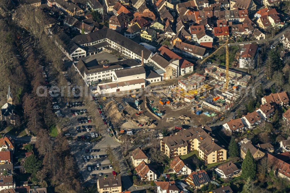 Staufen im Breisgau from the bird's eye view: Construction site to build a new multi-family residential complex Schladerer-Areal Sued in Staufen im Breisgau in the state Baden-Wurttemberg, Germany