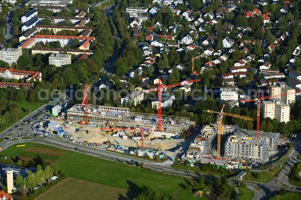 Aerial image Neuried - Construction site to build a new multi-family residential complex Suedlage on street Forstenrieder Strasse - Maxhofweg - Zugspitzstrasse in Neuried in the state Bavaria, Germany