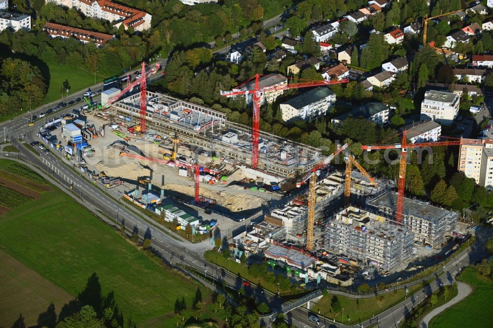 Aerial photograph Neuried - Construction site to build a new multi-family residential complex Suedlage on street Forstenrieder Strasse - Maxhofweg - Zugspitzstrasse in Neuried in the state Bavaria, Germany