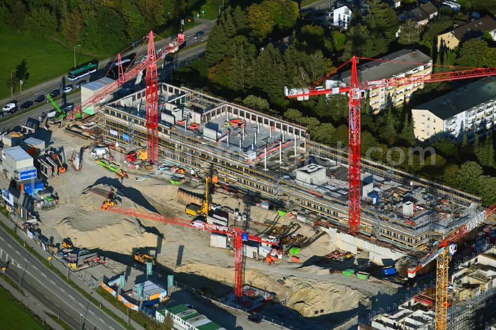 Neuried from above - Construction site to build a new multi-family residential complex Suedlage on street Forstenrieder Strasse - Maxhofweg - Zugspitzstrasse in Neuried in the state Bavaria, Germany