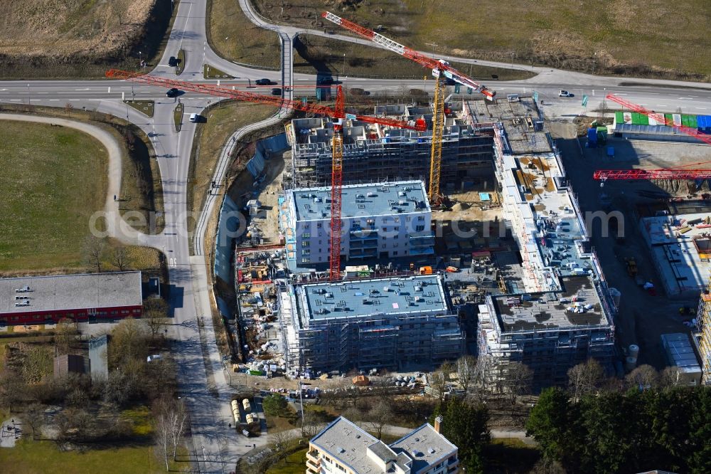 Neuried from above - Construction site to build a new multi-family residential complex Suedlage on street Forstenrieder Strasse - Maxhofweg - Zugspitzstrasse in Neuried in the state Bavaria, Germany
