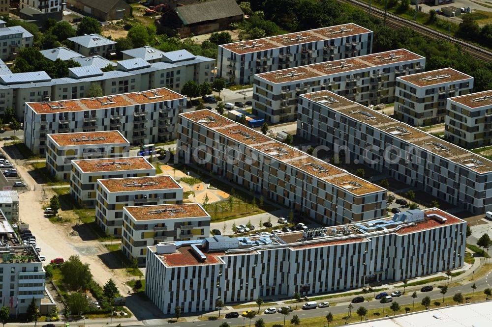 Schönefeld from the bird's eye view: Construction site to build a new multi-family residential complex Sonnenhoefe through the Deutsche Immobilien Entwicklungs AG on Angerstrasse - Aldebaronstrasse - Hons-Grade-Allee in Schoenefeld in the state Brandenburg, Germany