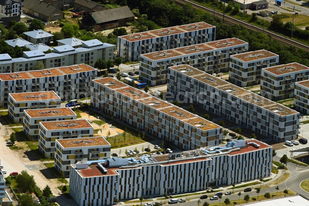 Schönefeld from the bird's eye view: Construction site to build a new multi-family residential complex Sonnenhoefe through the Deutsche Immobilien Entwicklungs AG on Angerstrasse - Aldebaronstrasse - Hons-Grade-Allee in Schoenefeld in the state Brandenburg, Germany