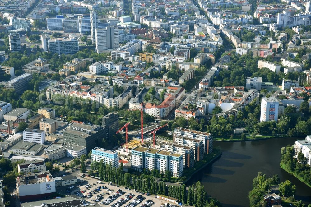 Berlin from the bird's eye view: Construction site to build a new multi-family residential complex Spree-One of OPTIMA-AEGIDIUS-FIRMENGRUPPE Nymphenburger Beteiligungs AG on Dovestrasse in the district Charlottenburg-Wilmersdorf in Berlin, Germany