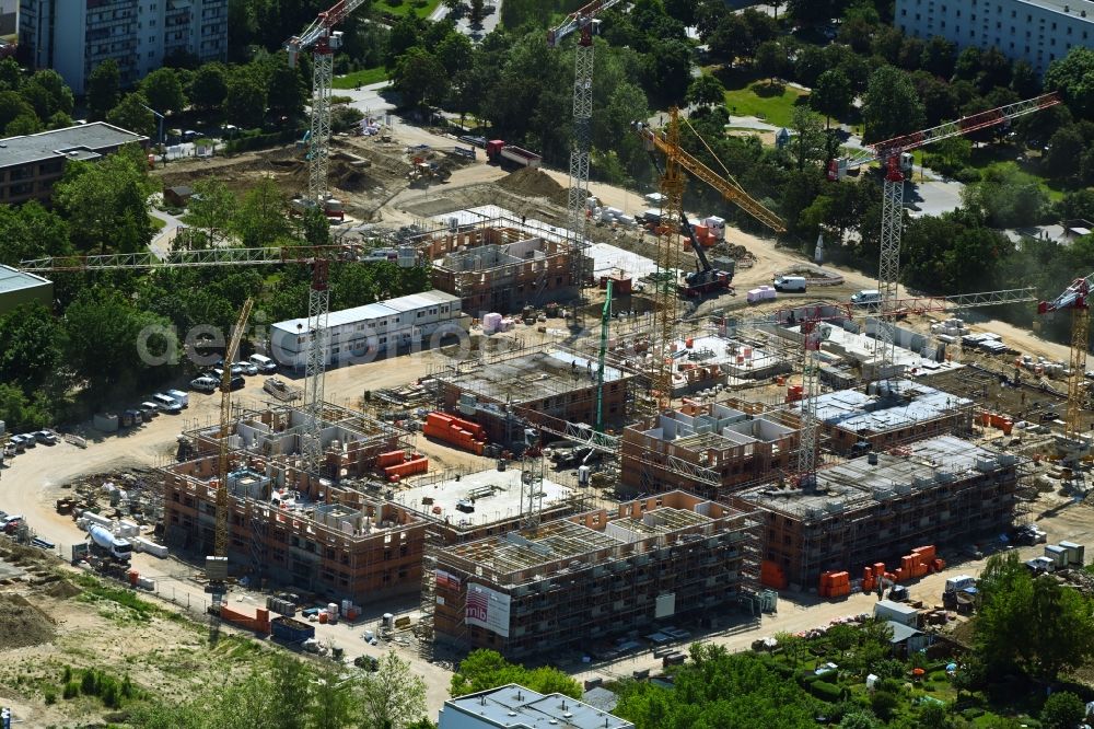 Berlin from above - Construction site to build a new multi-family residential complex Stadtgut on street Alt-Hellersdorf - Havellaender Ring in the district Hellersdorf in Berlin, Germany