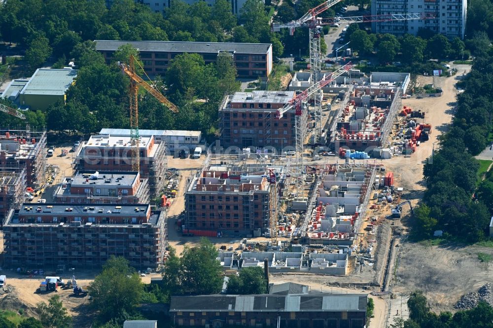 Berlin from above - Construction site to build a new multi-family residential complex Stadtgut on street Alt-Hellersdorf - Havellaender Ring in the district Hellersdorf in Berlin, Germany
