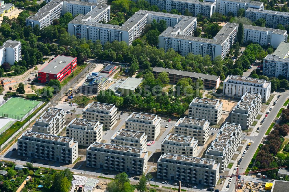 Berlin from above - Construction site to build a new multi-family residential complex Stadtgut on street Alt-Hellersdorf - Havellaender Ring - Eva-Strittmatter-Strasse in the district Hellersdorf in Berlin, Germany