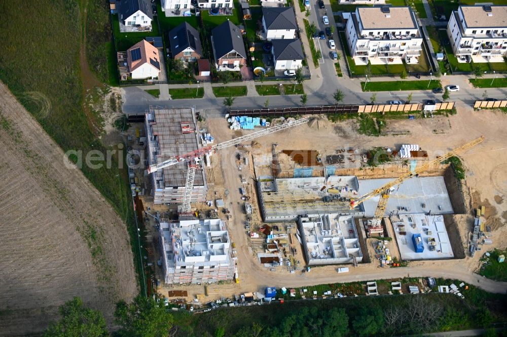 Aerial image Schönefeld - Construction site to build a new multi-family residential complex Stadthaeuser on Park on street Alfred-Doeblin-Allee - Grossziethener Weg in Schoenefeld in the state Brandenburg, Germany